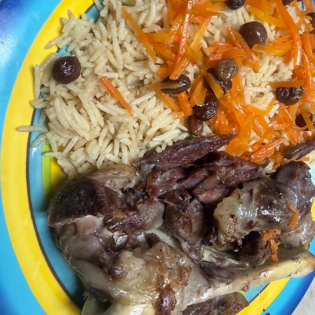 4. Tandoori Lamb Shank Over Pulao Rice.