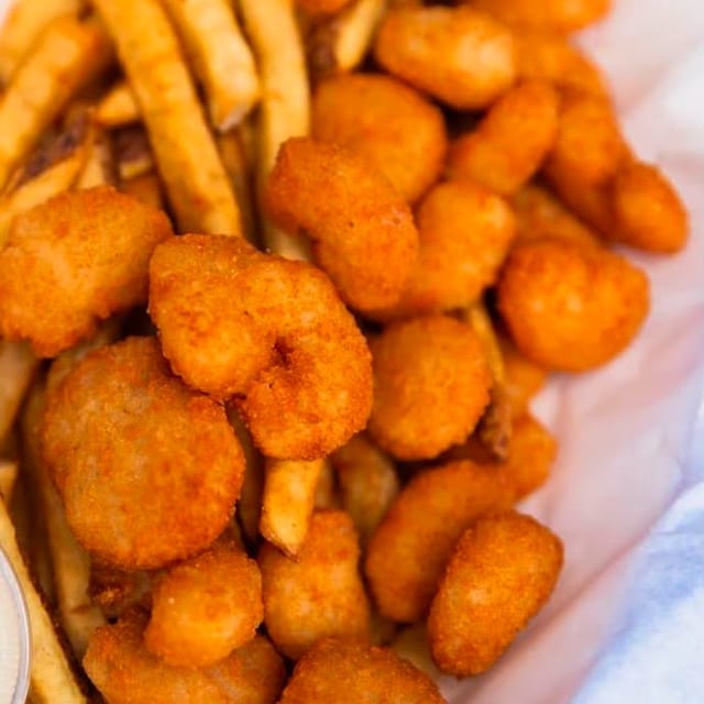27. Popcorn Shrimp with French Fries.